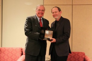 Interim dean Ron Owston receives his award from the Right Honourable Paul Martin, former Prime Minister of Canada 