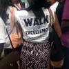 A student wearing A Walk with Excellence t-shirt