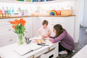 Joanne Babalis and a child in her studio
